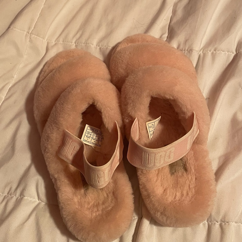 Pink fuzzy ugg slippers